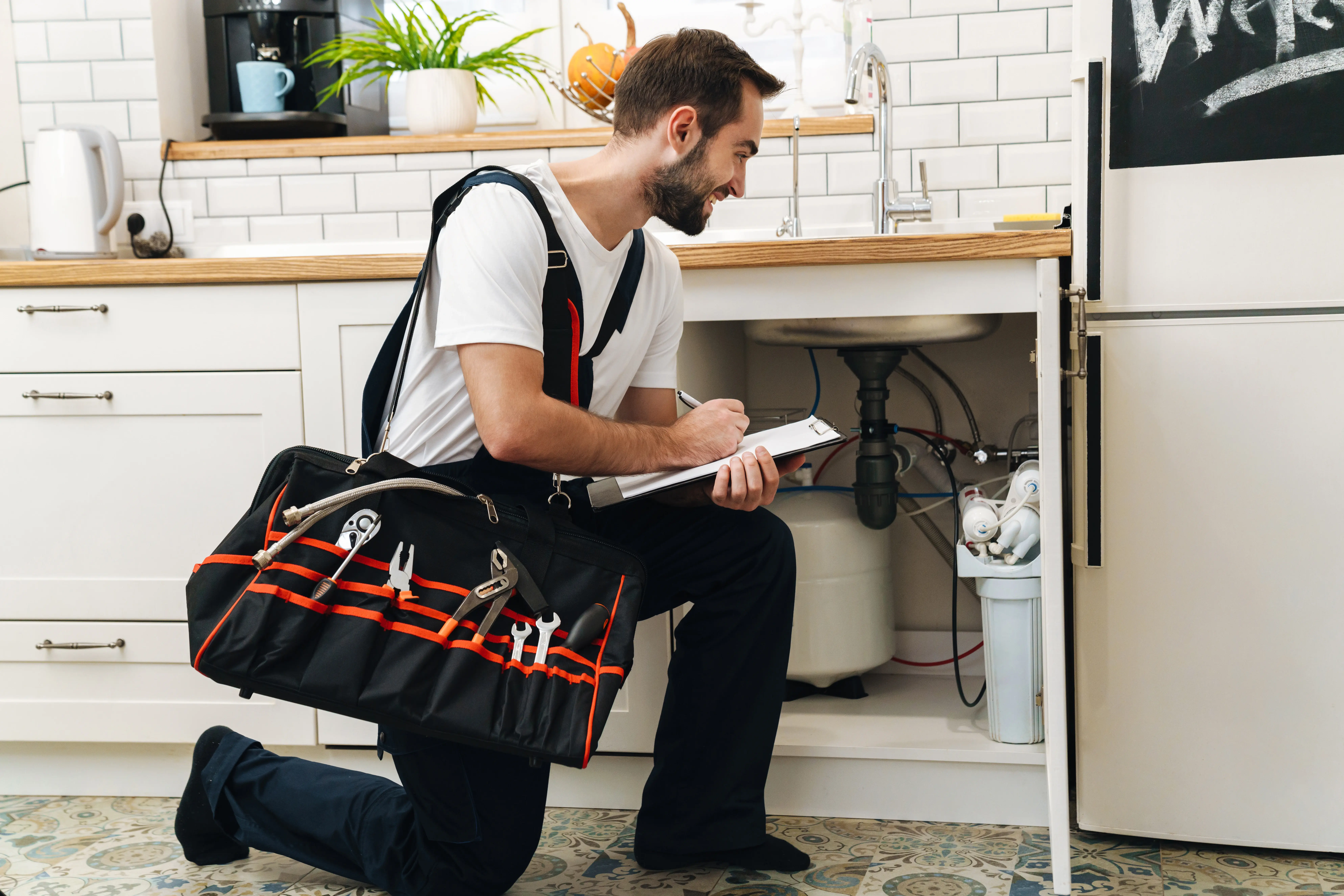 man doing hydrostatic plumbing inspections for home inspectors